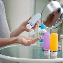 TRVLMORE Silicone Reisflesjes - Navulbaar - Handbagage - 100 ML - 3 Stuks - Oranje/Paars/Blauw -Verzorgingsproducten 1200x1200 791